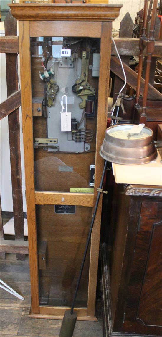 Macenta Time Co. Master Clock in glazed oak case & a copper-cased clock